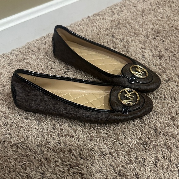 Michael Kors Shoes - NEW Michael Kors Dark Brown Flats with Gold Logo size 8